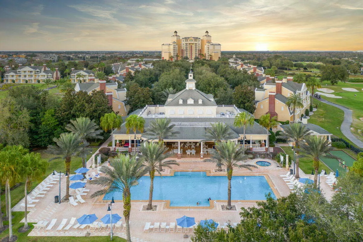 Seven Eagles pool and landscaped resort grounds at sunset